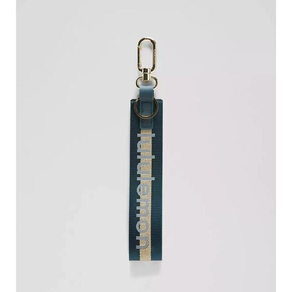NEW Lululemon Never lost Keychain Wordmark Warp Teal Gold Blue - Picture 8 of 9
